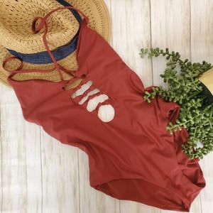 Becca Virtue Burnt Sienna one piece caged swimsuit